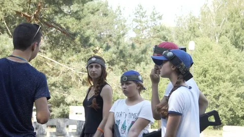 Teens are ready to play Laser tag. 10.08.2017. Kyiv. Ukraine. Stock Footage 78778855