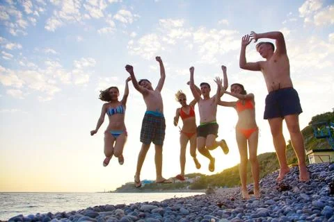 Teens on beach Stock Photos