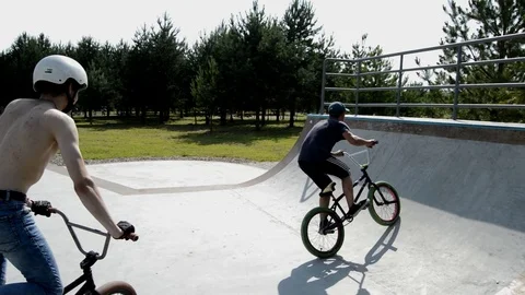 Teens on BMX bikes Stock Footage 101690953