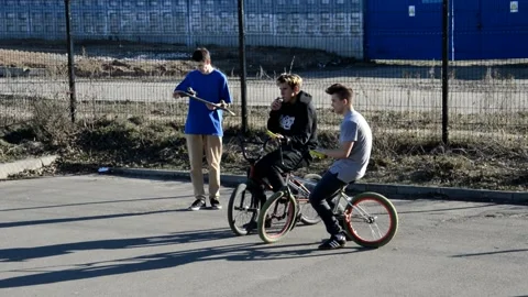 Teens on BMX bikes Stock Footage 131064047