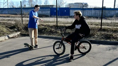 Teens on BMX bikes Stock Footage 131065361