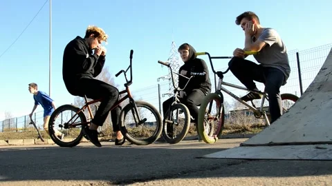 Teens on BMX bikes Stock Footage 131065546