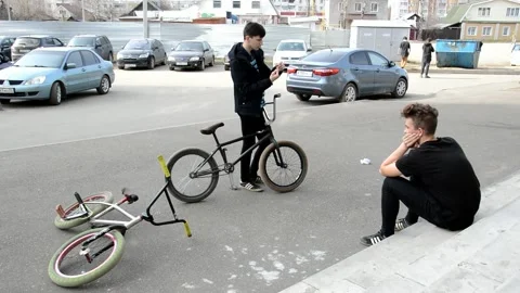 Teens on BMX bikes Stock Footage 131203143