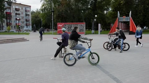 Teens on BMX bikes Stock Footage 280222022