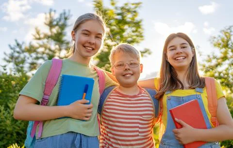 Teens going to school Stock Photos
