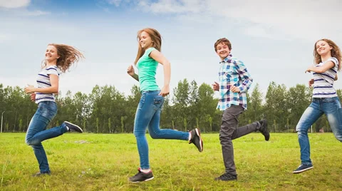 Teens having fun on the meadow Stock Footage 35697426