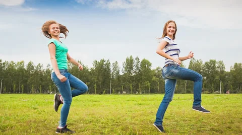Teens having fun on the meadow Stock Footage 35849708