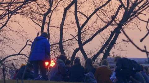 Teens having fun on a sunset in park. Video stock 151294484