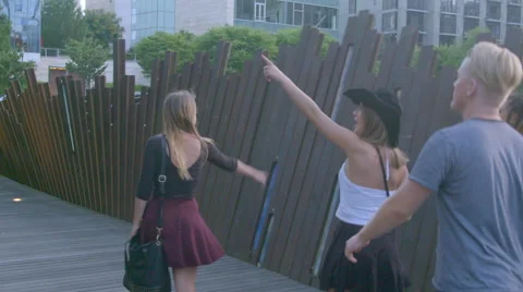 Teens look around walking Stock Footage 54060092