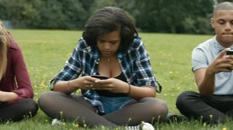 Teens on phones Stock Footage 22665100