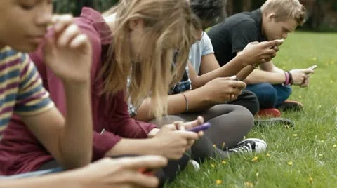 Teens on phones Stock-Footage 22665101