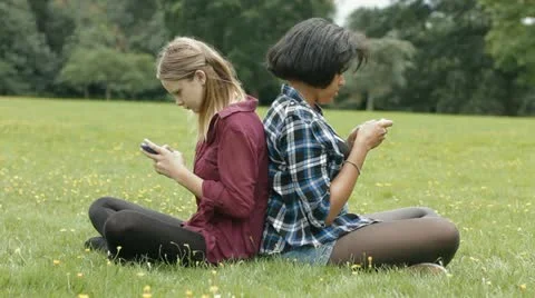 Teens on phones Stock Footage 22665105