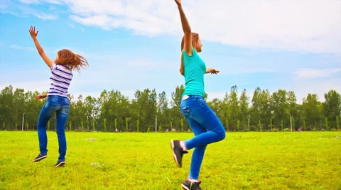 Teens running through the meadow Video stock 27893837