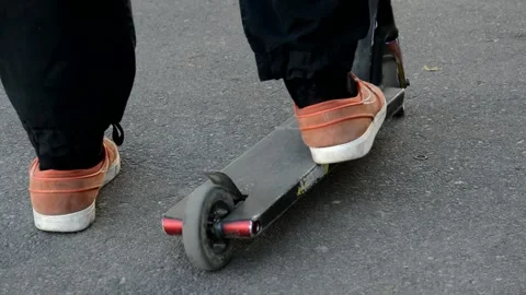 Teens on scooters Stock Footage 133387313