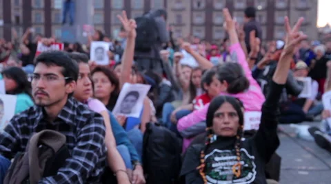 Teens shout slogans in a march protest for the students disappeared in Guerrero. Stock Footage 44264031
