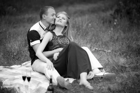 Teens sitting on grass Stock Photos