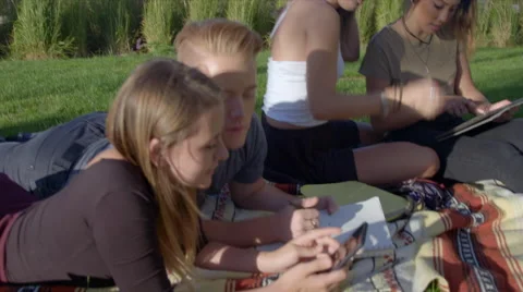 Teens study using technology Stock Footage 53557073