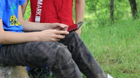 Teens Surfing In Internet With A Tablet PC At The Park Stockbeeldmateriaal 50578908