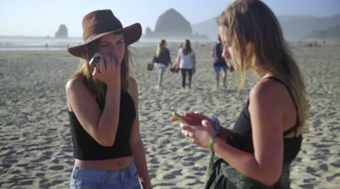 Teens talking on cell phones Stock Footage 53060479
