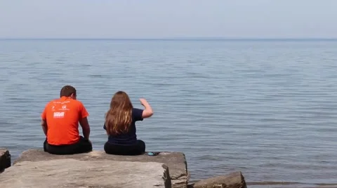 Teens by the water Stock Footage 50442547