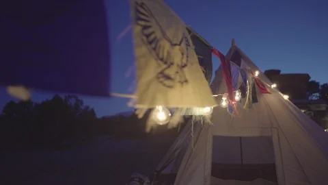 Teepee Camp with lights and prayer flags Stock Footage 123425982