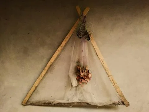 Teepee with hanging netting, rustic charm Stock Photos