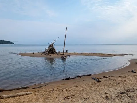 Teepee structure made of wood of Sand Coast Beach Stock Photos