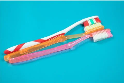 Teeth cleaning tool on blue background Stock Photos