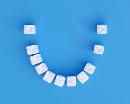 Teeth made of sugar cubes on blue background, some teeth missing. Sweet tooth Stock Illustration