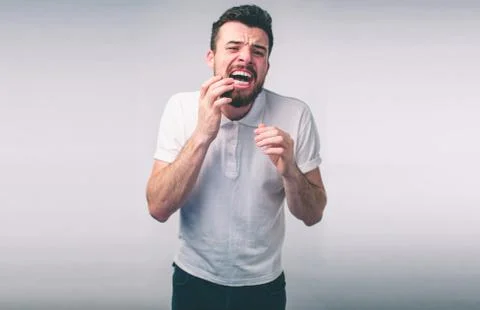 Teeth Problem. Man Feeling Tooth Pain. Closeup Of Bearded boy Suffering From Stock-Fotos