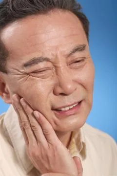 Teeth Vertical frame Alone Seniors only Luxx Portrait Just one man. Oriental Stock Photos
