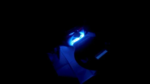 Teeth whitening procedure with ultraviolet light UV lamp Stock Footage 106204641