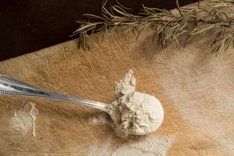 Teff flour on a spoon Stock Photos