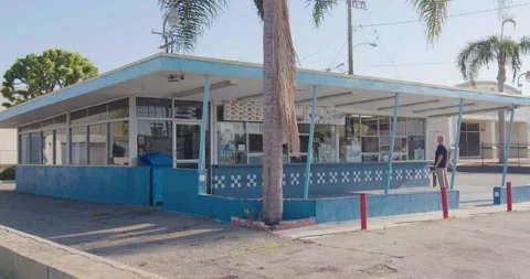 TEHACHAPI, CA - 2023 - Exterior of a fast food outdoor burger takeaway Stock Footage 264609625