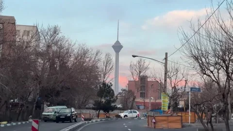 Tehran downtown street view of cityscape urban skyline above Milad Tower Stock Footage 338315941