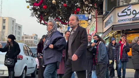 Tehran evening street Festive and joyful selfies sidewalk smiling people and Stock Footage 338315053