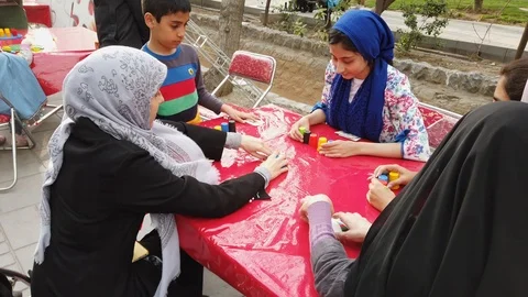 Tehran, Iran - 2019-04-03 - Street Fair Entertainment 22 - Children Stacking Stock Footage 108540600