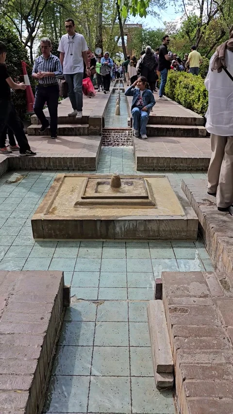 Tehran Iran Apr 11 2024 :Springtime Bliss: People Enjoying an Iranian Garden Stock Footage 272266361