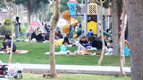Tehran, Iran - March 27, 2018: Iranian travelers living in tents on the beach at Video stock 106941647