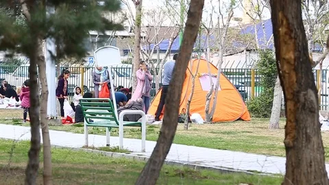 Tehran, Iran - March 27, 2018: Iranian travelers living in tents on the beach at 스톡 동영상 106941811