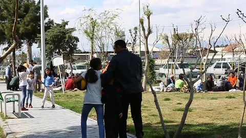 Tehran, Iran - March 27, 2018: Iranian travelers living in tents on the beach at Stock Footage 106942152