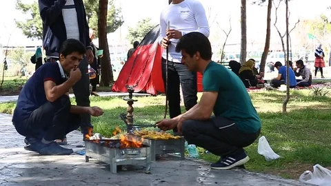 Tehran, Iran - March 27, 2018: Iranian travelers living in tents on the beach at 스톡 동영상 106942601