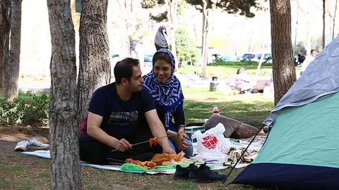 Tehran, Iran - March 27, 2018: Iranian travelers living in tents on the beach at 스톡 동영상 106942783