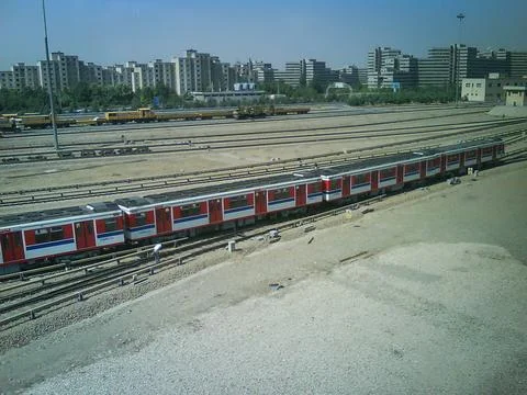 Tehran Metro with moving train and view of Ekbatan and Apadana Stock Photos