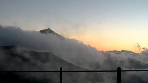 Teide peak at sunset above cloud inversion in Tenerife Video stock 334975564