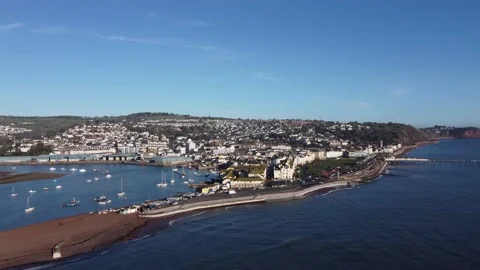 Teignmouth, Devon: Drone View: Teignmouth seafront, pier &amp; River Teign estuary Stock Footage 168570181