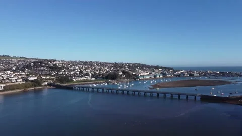 Teignmouth, Devon: Drone View, Zoom In: River Teign bridge &amp; Teignmouth town Stock Footage 168567652