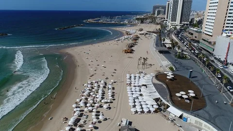 Tel Aviv coast line, people on the beach, aerial drone footage Stock Footage