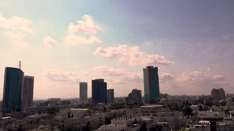 Tel aviv, Fast moving clouds, Tel Aviv buildings Stockbeeldmateriaal 196970940