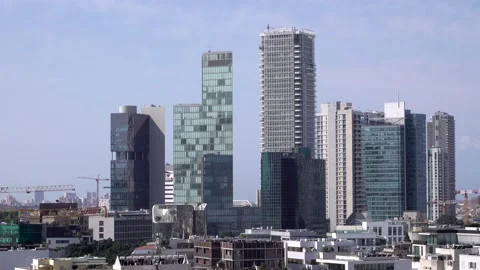 Tel aviv, Fast moving clouds, Tel Aviv buildings Stockbeeldmateriaal 196971160